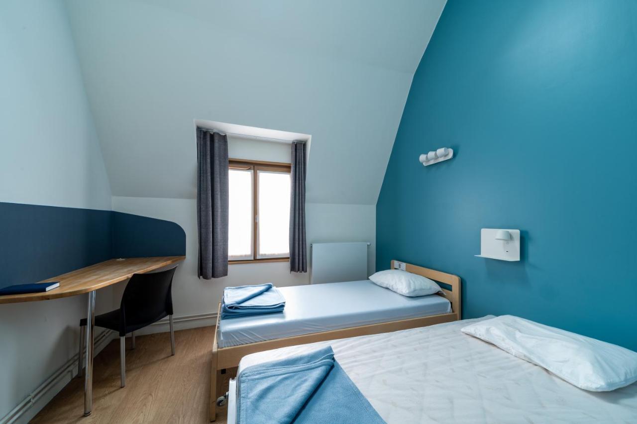 Lit dans Dortoir Masculin de 3 Lits